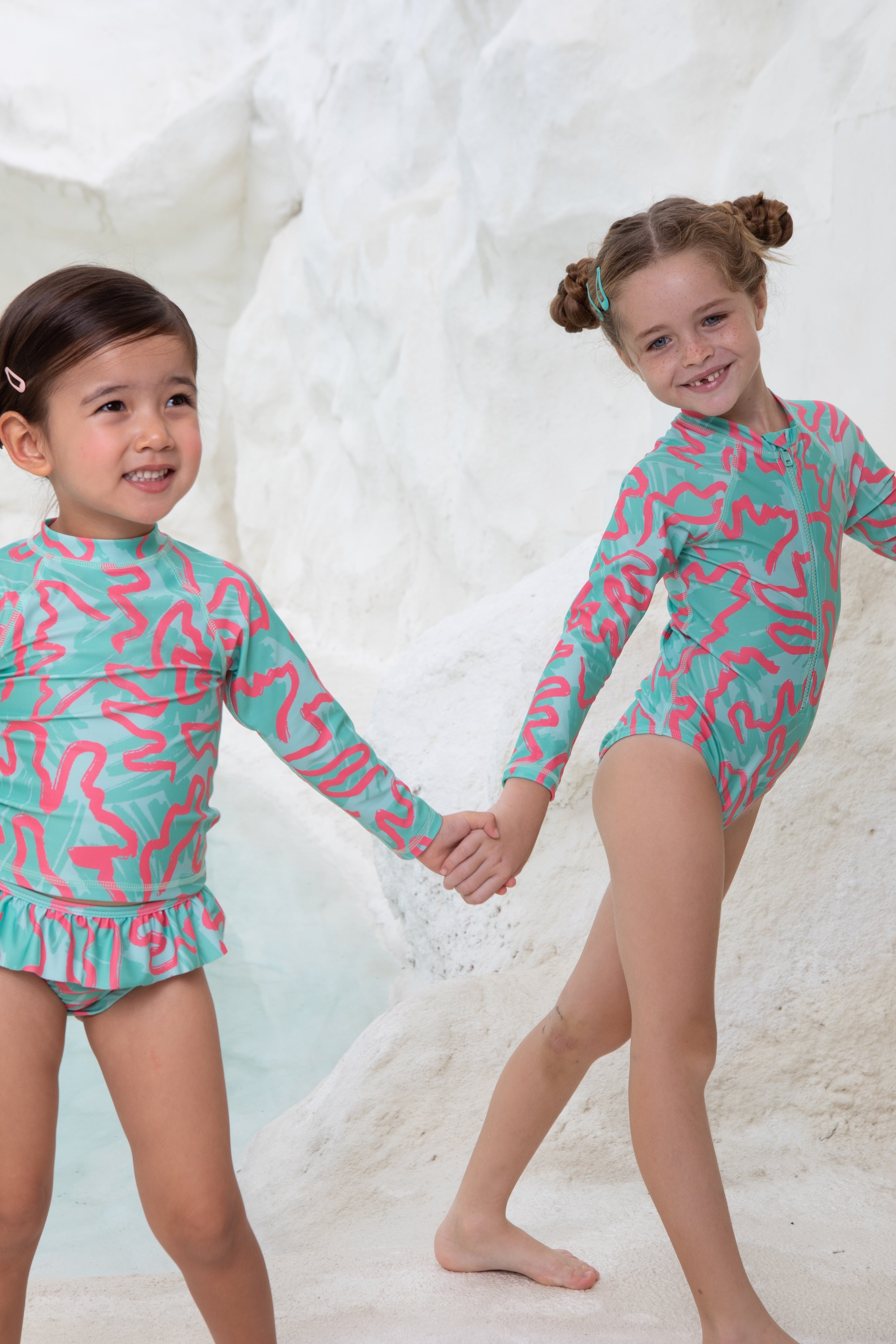 Girls Badeanzug langarm - Coral – von KINDISCH, UV-Schutz