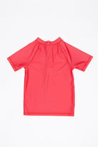 A UV-Shirt kurzarm - Paradise Red by kindischworld.com, short-sleeved and pinkish-red, is laid flat on a white background with the back side visible.