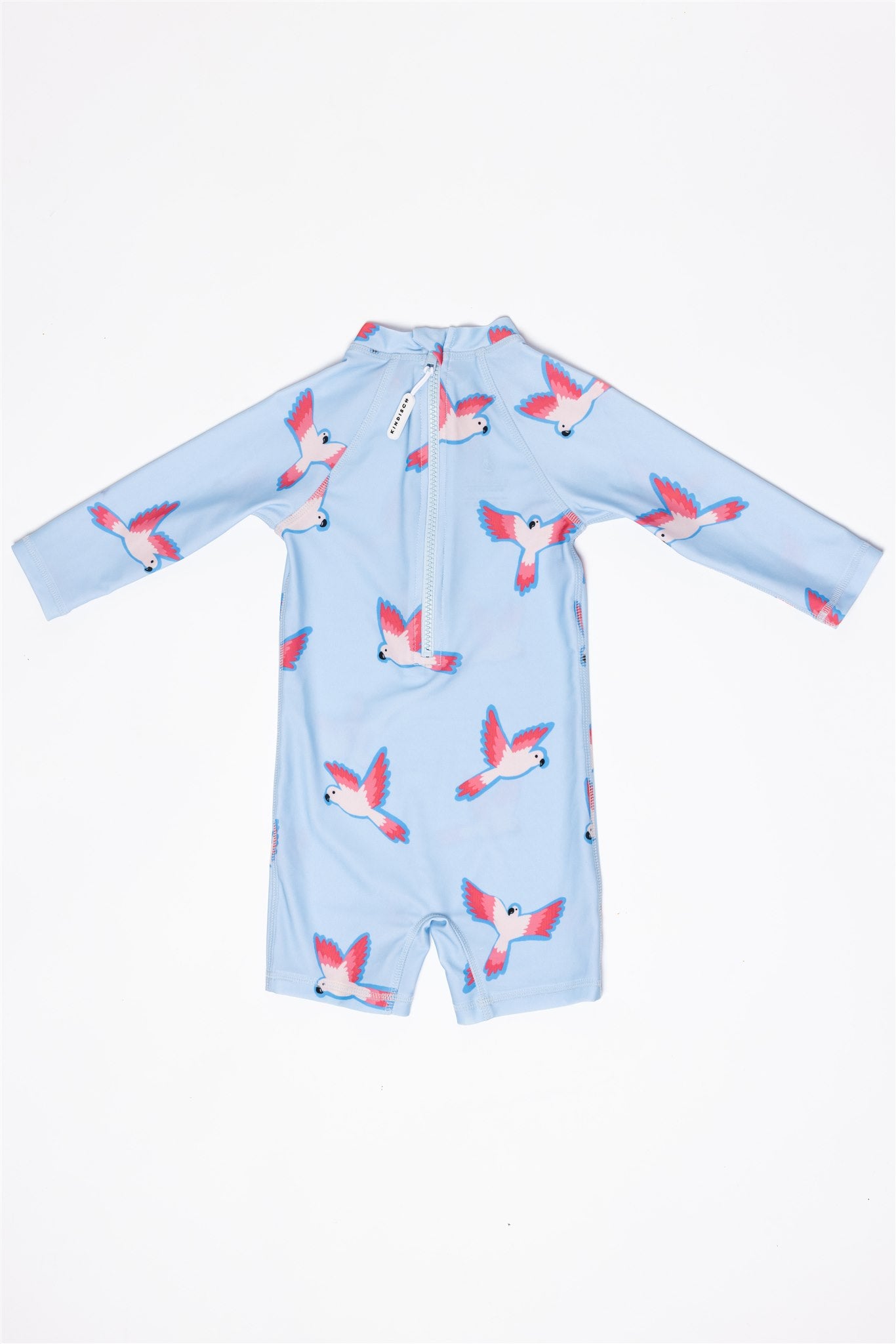 The Baby Badeanzug - PARROT from kindischworld.com is a light blue, long-sleeved infant romper with back zipper and flying bird pattern—perfect UV-Badebekleidung with UPF50+ for sun protection.